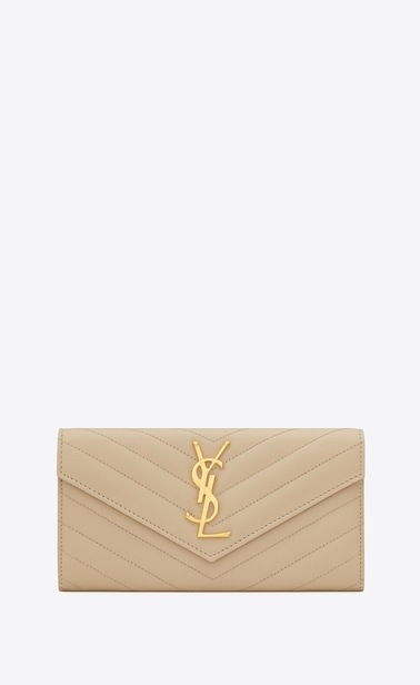 Monogram large flap wallet in grain de poudre embossed leather